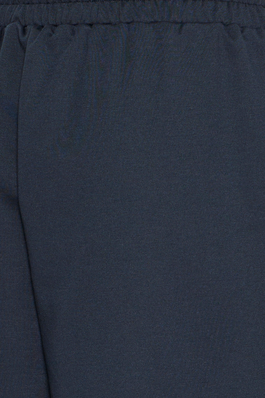 Dark blue cotton-blend pants by ICHI, featuring elastic waistband and textured knit fabric, close-up view