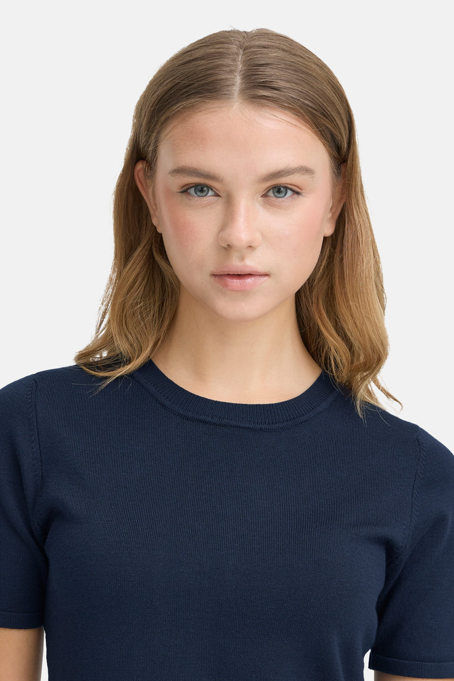 Navy blue short-sleeve crewneck sweater with ribbed texture, front view on model