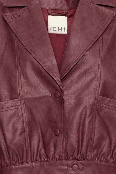 Burgundy faux leather vest by ICHI with structured lapels, button closure, and textured surface in close-up front view