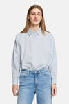 Blue and white striped long-sleeve blouse with pointed collar and front buttons, worn with light wash jeans, front view.