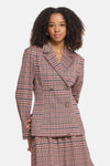 Multicolored plaid double-breasted blazer with structured shoulders and four-button front, worn in a full-length studio shot.