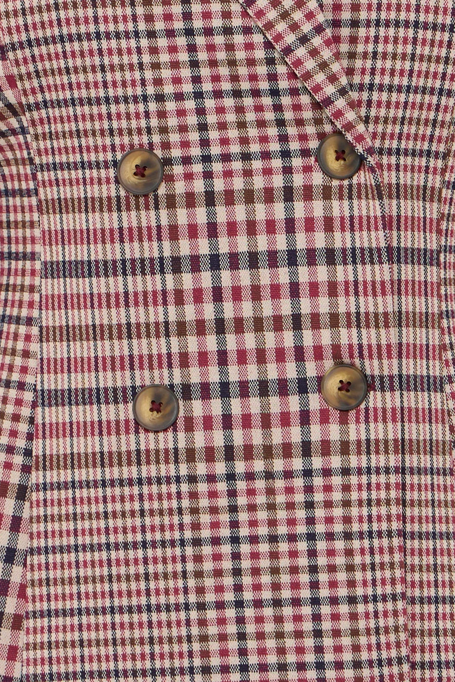Multicolored plaid blazer with red, navy, and beige checks, featuring four dark buttons, close-up front view