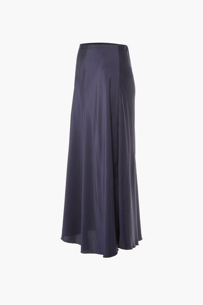 Navy blue midi skirt with flowing satin-like fabric, front slit, and high waist, shown in side view.