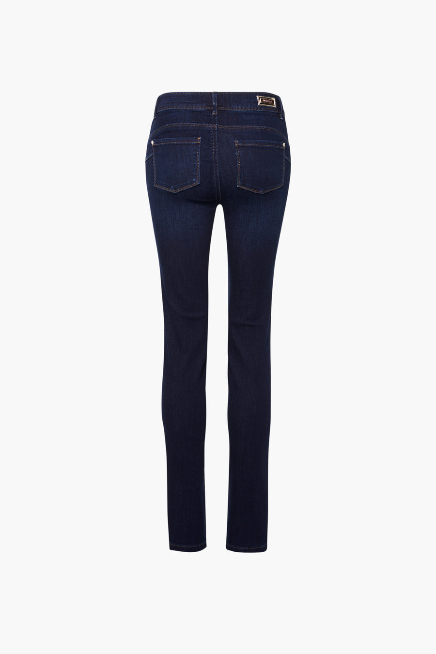 Jean skinny bleu de Morgan de Toi, avec poches arrière, coutures apparentes et badge de la marque à la ceinture.