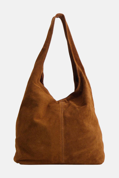 Sac à main brun en daim par Access® avec une couture verticale au centre.