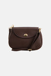 Brown textured leather crossbody bag with gold-tone hardware and flap closure, front view
