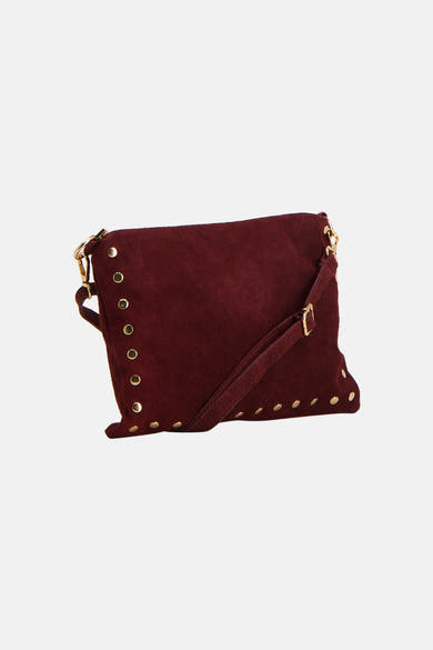 Burgundy suede crossbody bag with gold-tone studs and adjustable strap, front view
