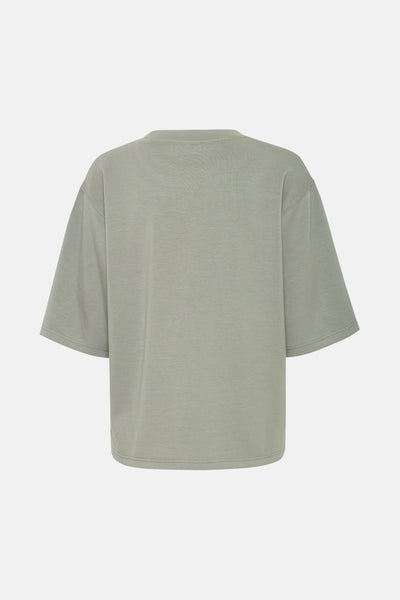 Sweat-shirt vert de Fransa, coupe ample à manches courtes, sur un fond clair.
