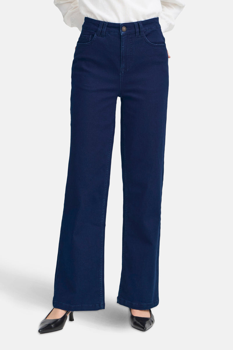 Jean large en denim bleu foncé de Fransa, avec des poches et une coupe ample.