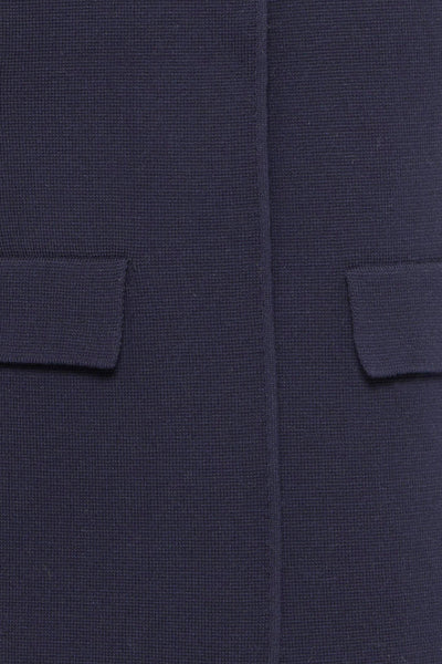 Blauwe gebreide cardigan van Fransa, met opgestikte zakken aan de voorkant.