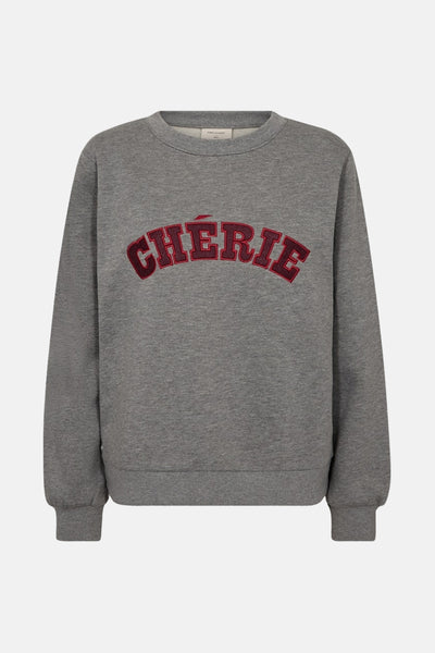 Sweat-shirt gris de FREEQUENT, avec l'inscription "Chérie" bordeaux en lettres appliquées.
