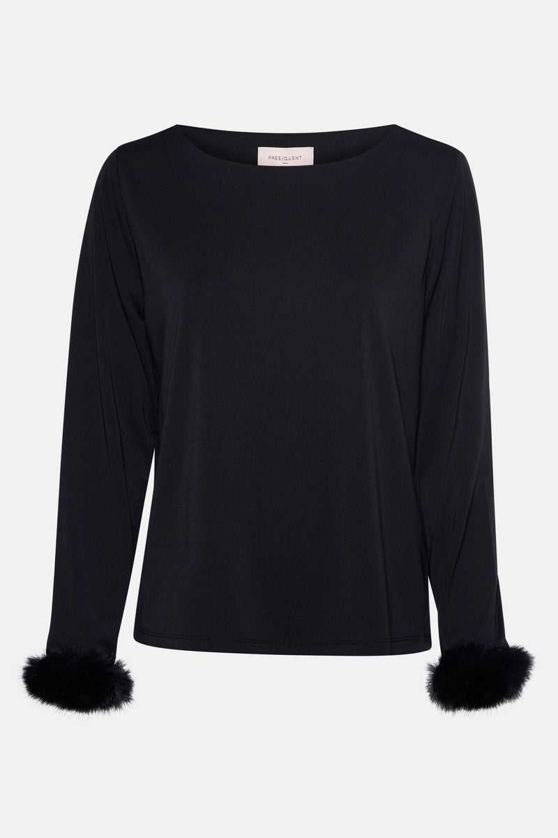 Blouse noire à manches longues de FREEQUENT avec détails en fausse fourrure aux poignets.

