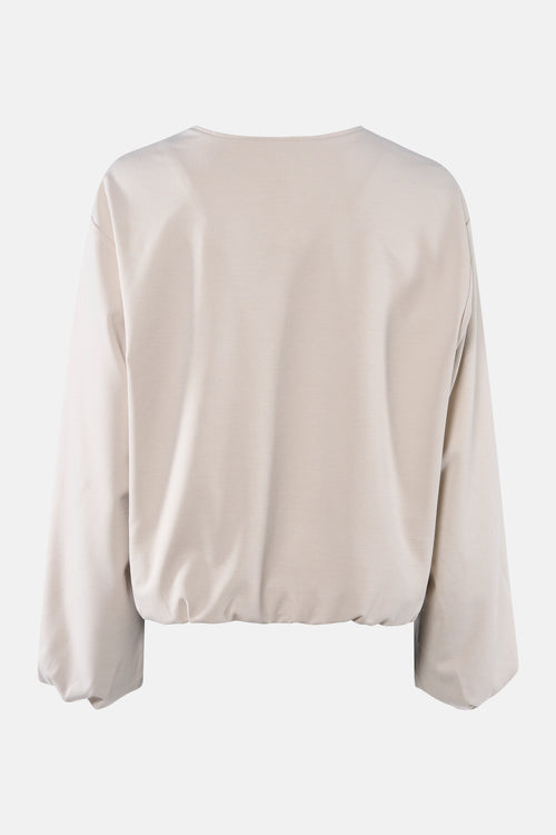 Veste courte beige de FREEQUENT, manches longues bouffantes et ourlet élastique.
