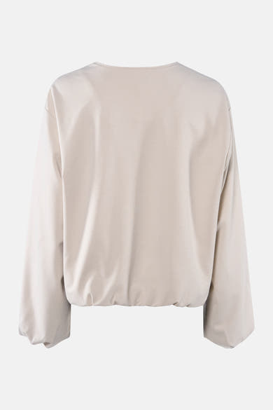 Veste courte beige de FREEQUENT, manches longues bouffantes et ourlet élastique.