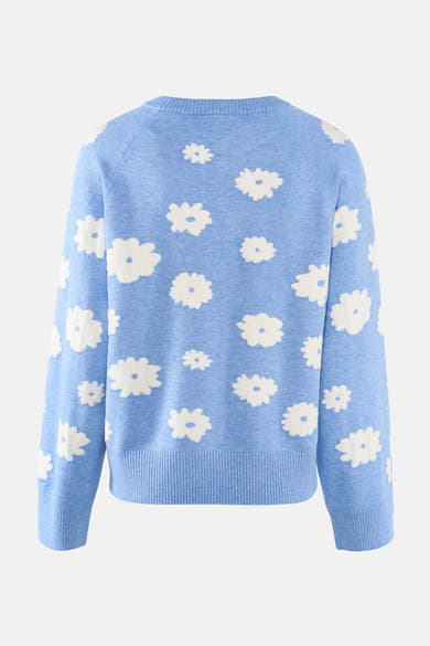 Pull bleu à col rond de FREEQUENT, orné de motifs floraux blancs sur l'ensemble.
