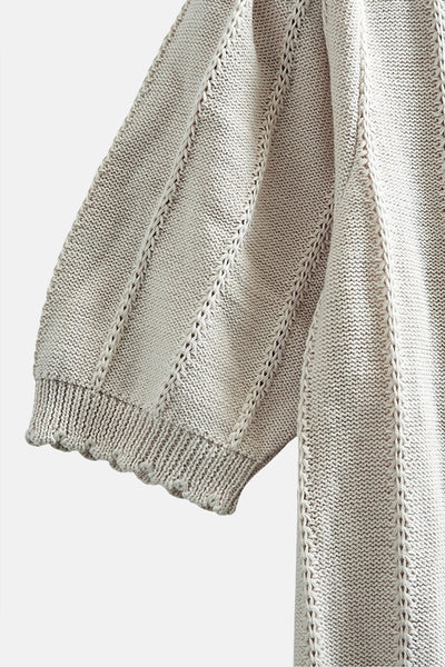 Pull col rond beige de FREEQUENT, en maille ajourée avec bordures côtelées à manches courtes.