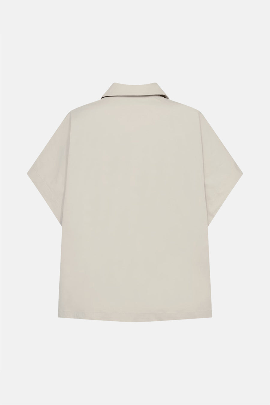 Veste courte beige de FREEQUENT, avec col classique, manches courtes et coupe carrée.