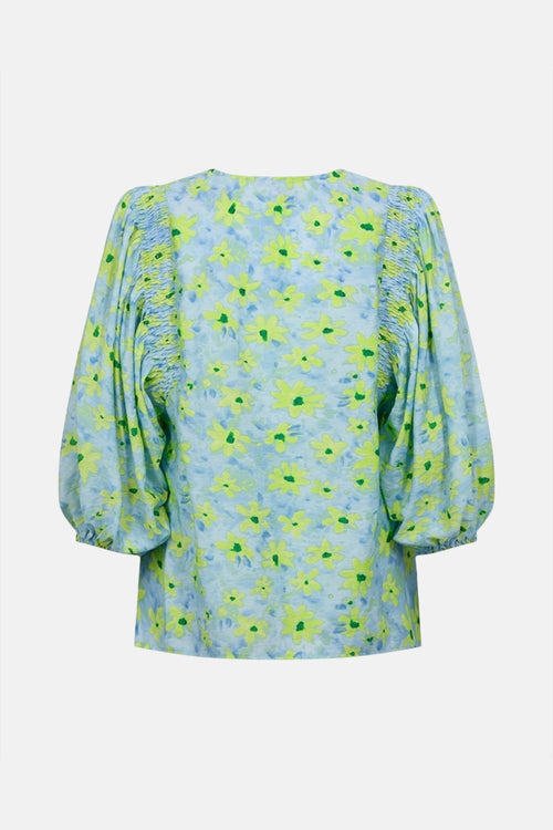 Blouse multicolore FREEQUENT à manches bouffantes avec motif floral jaune et détails froncés.