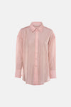 Pink long-sleeve shirt with shimmering texture and button-down front, by Zara, shown in front view.