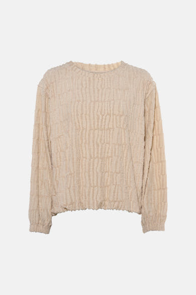Beige textured sweatshirt with ribbed pattern and frayed edges, front view