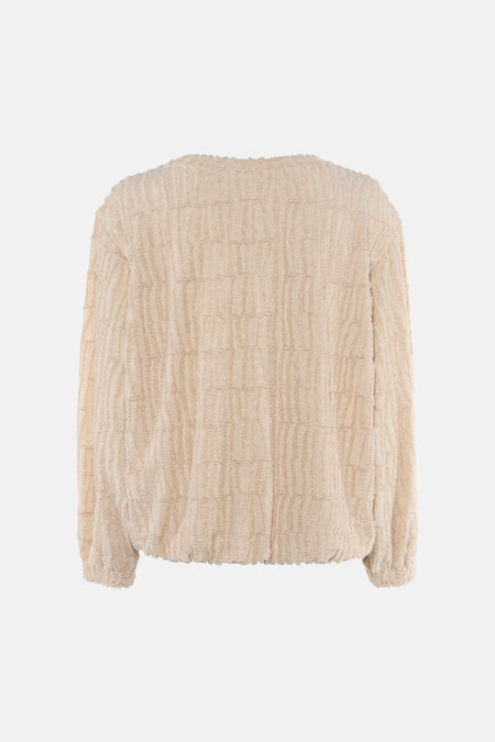 Beige textured crewneck sweatshirt with ribbed pattern and frayed edges, back view
