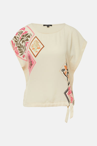 Blouse beige à manches courtes de COMMA, agrémentée de motifs losanges floraux sur le devant.