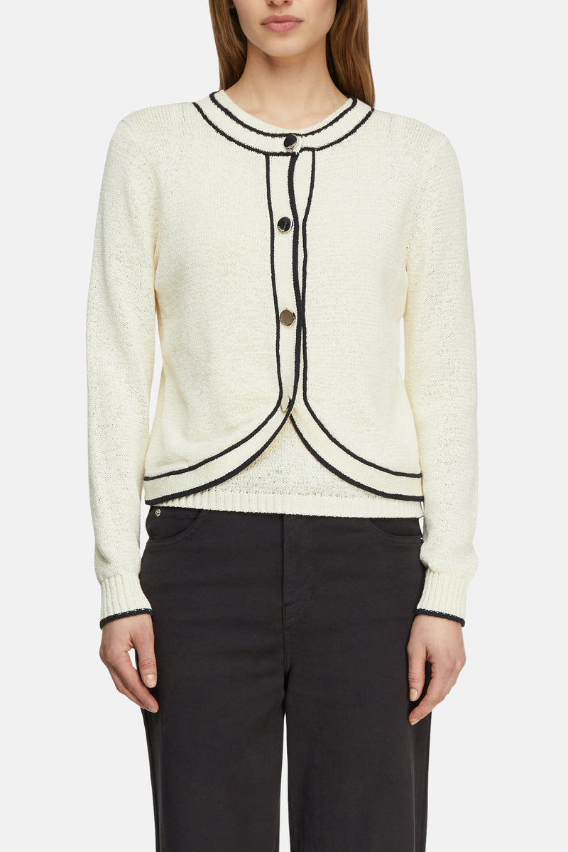 Beige vest van COMMA, met zwarte bies en gebreide details, van achteren gezien.