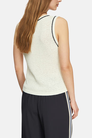 Top sans manches beige de COMMA, avec bordure noire contrastante et texture tricotée.