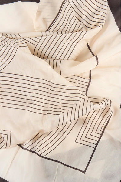 Cream foulard with black geometric stripe pattern, soft lightweight fabric, folded close-up view