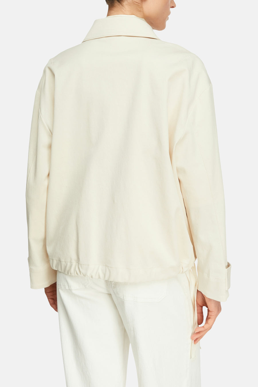 Veste courte beige de COMMA, avec manches longues et détail froncé à la taille.