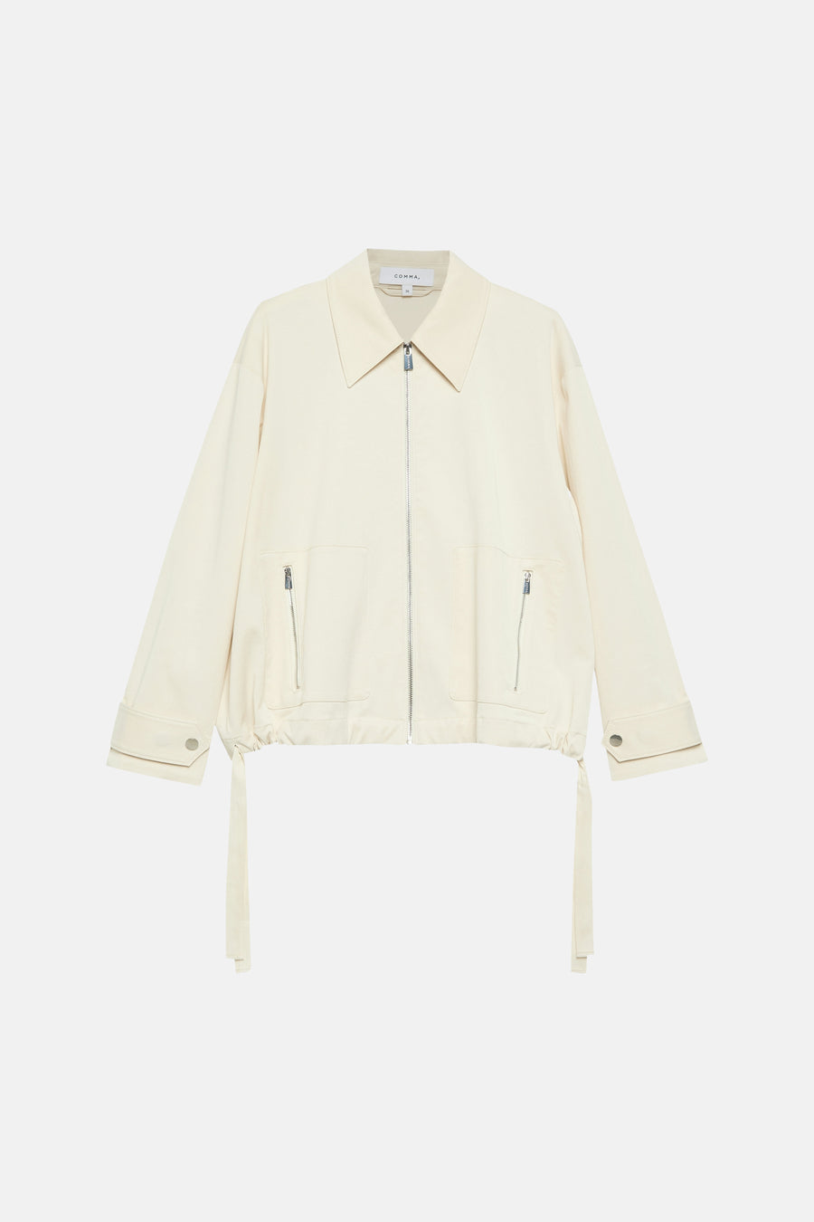 Korte beige jas van COMMA, met zilveren ritssluiting en strikdetails.