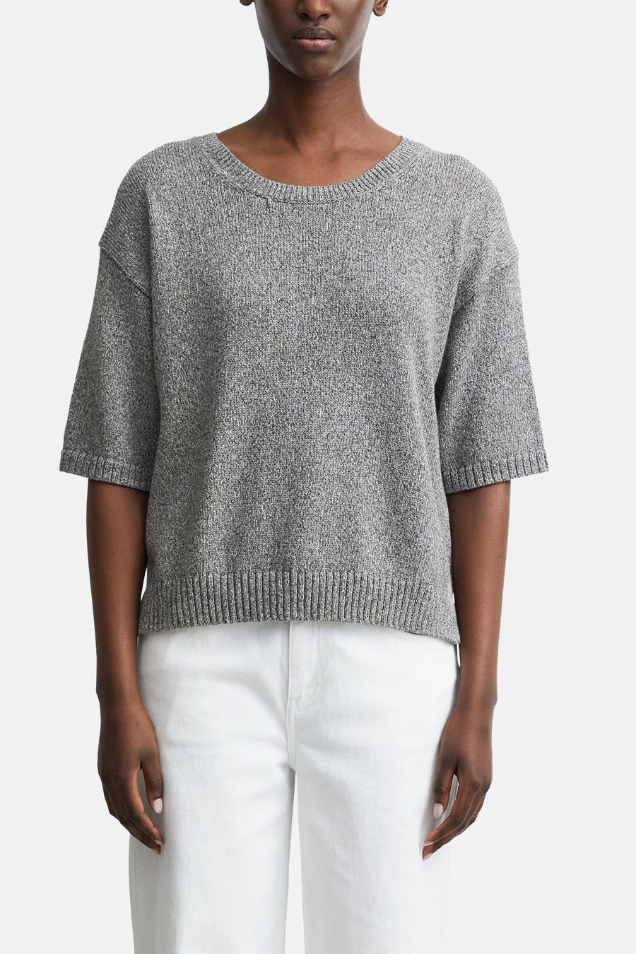 Brown crewneck sweater by COMMA, textured knit with ribbed hem and short sleeves, worn with white pants, front view