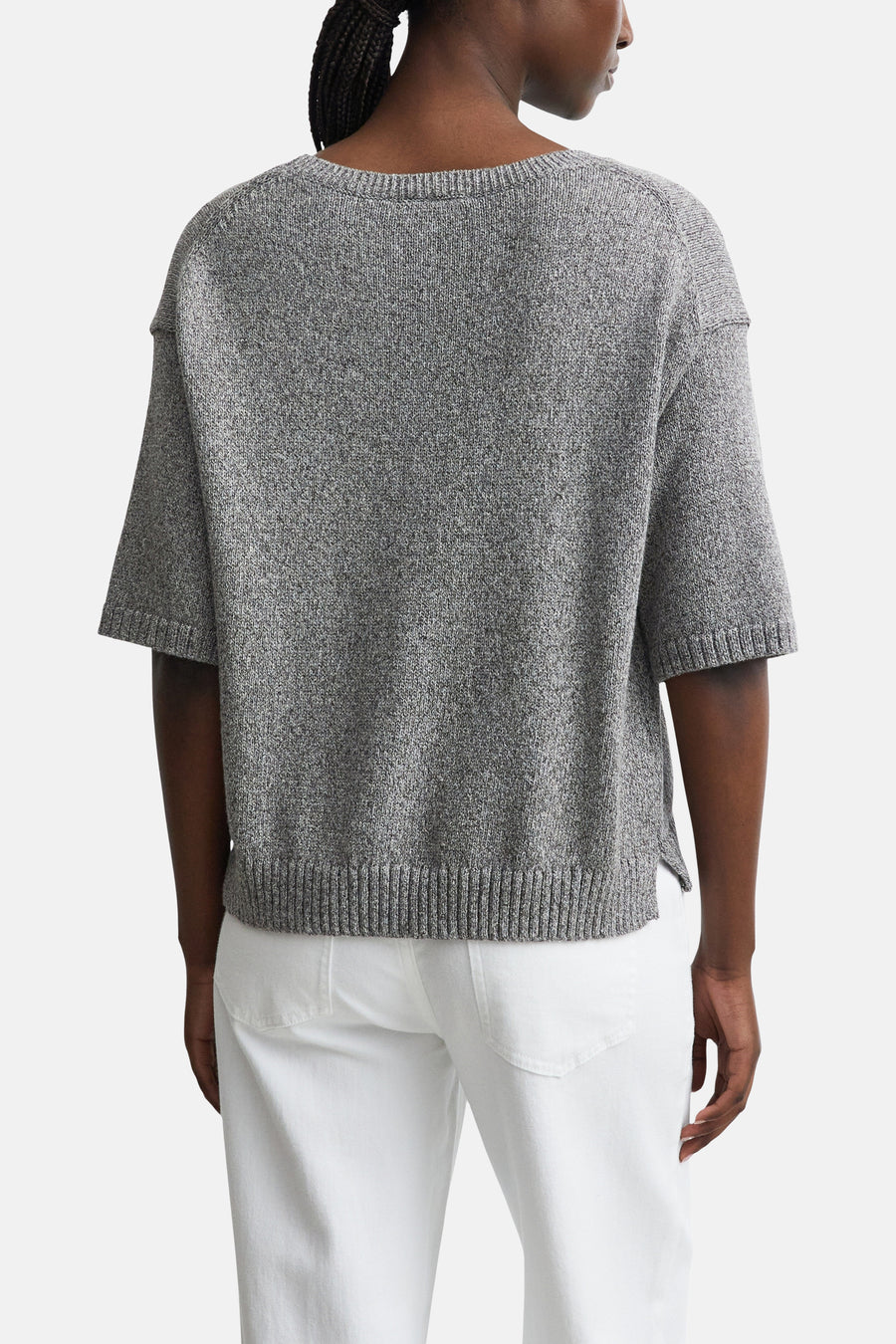 Brown crewneck sweater by COMMA, back view, heathered knit texture, short sleeves, ribbed hem and cuffs, worn with white pants