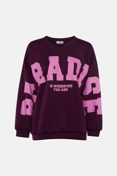 Dark purple crewneck sweatshirt with bold pink "BABY IS WHEREVER YOU ARE" graphic, by Toga Pulla, front view
