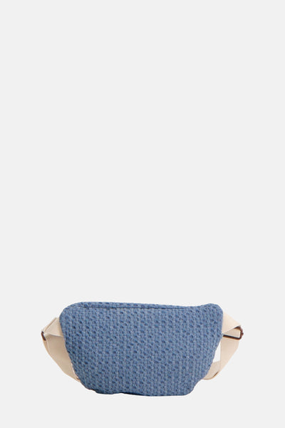 Sac à main bleu par Levi's® Accessories, en tissu texturé avec une bandoulière couleur crème.