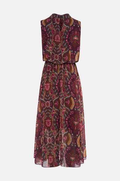 Multicolored sleeveless dress with floral paisley print, high neckline, and flowing silhouette, back view