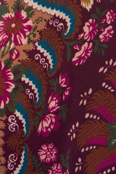 Multicolored sleeveless robe with vibrant floral and paisley pattern, rich textured fabric close-up