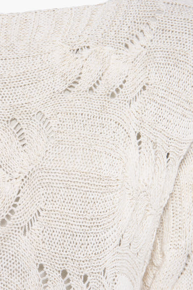 Pull écru de Terra di Siena avec motif ajouré et détails scintillants.

