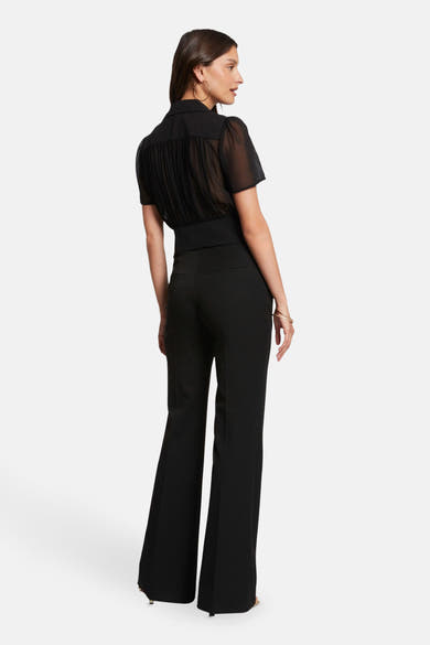 Zwarte blouse met korte mouwen van Morgan de Toi, met plooidetail en getailleerde taille.