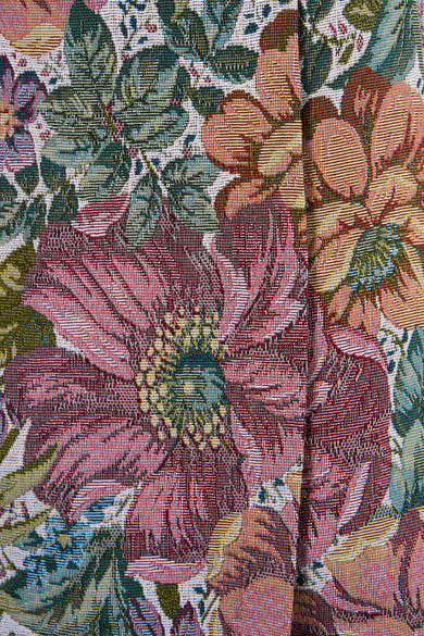 Multikleuren korte rok van Terra di Siena, vintage bloemenpatroon met rijke tinten en complexe geweven textuur.