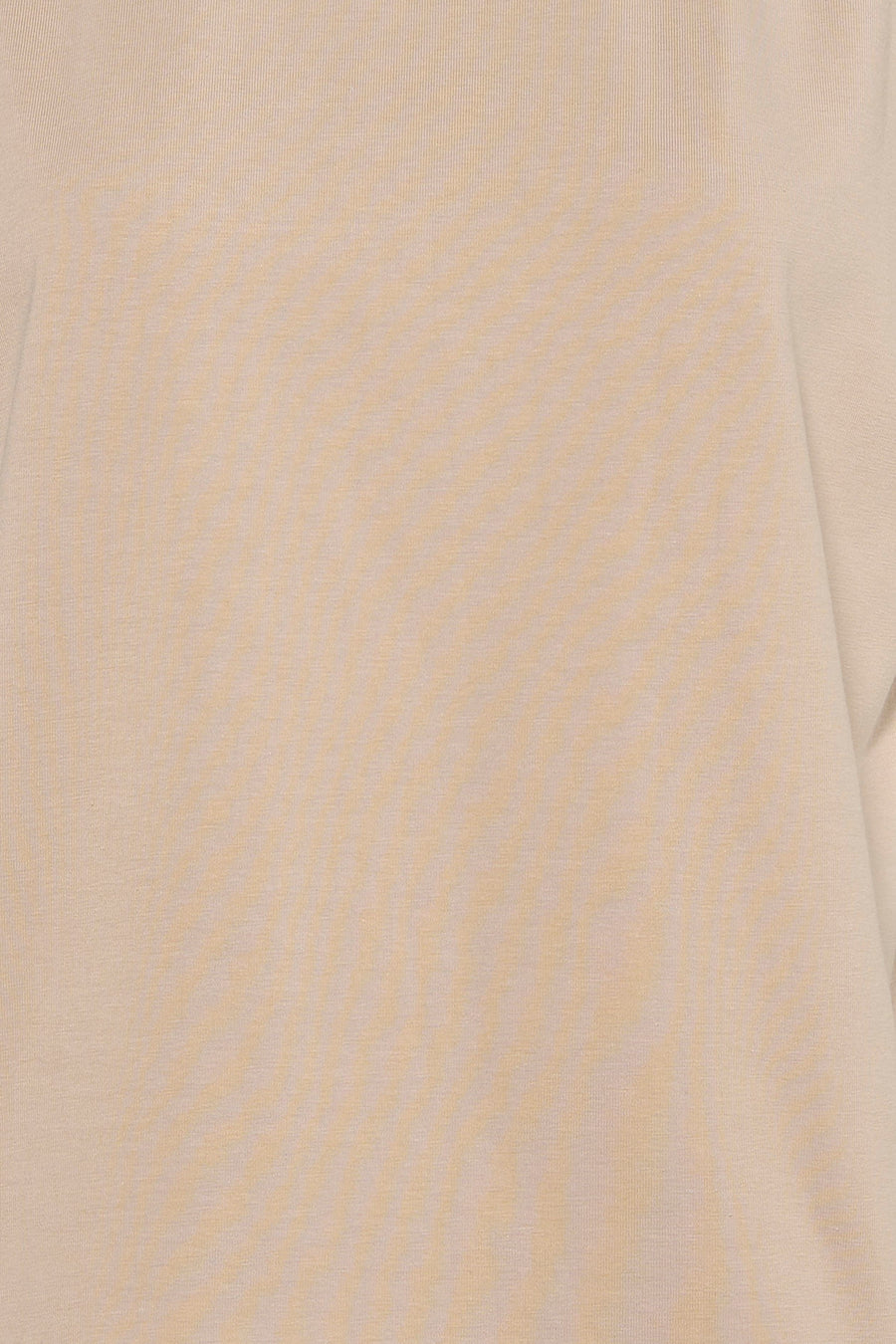 Beige short-sleeve t-shirt with soft knit texture, close-up front view showing subtle fabric weave and natural color variation