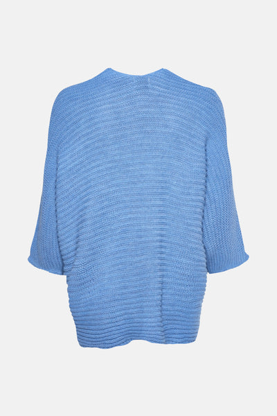 Gilet bleu en maille de Terra di Siena, manches courtes et larges, texture côtelée.