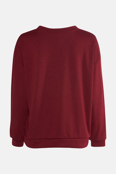 Sweat rouge de Terra di Siena, coupe ample, manches longues et col rond, vue de dos.