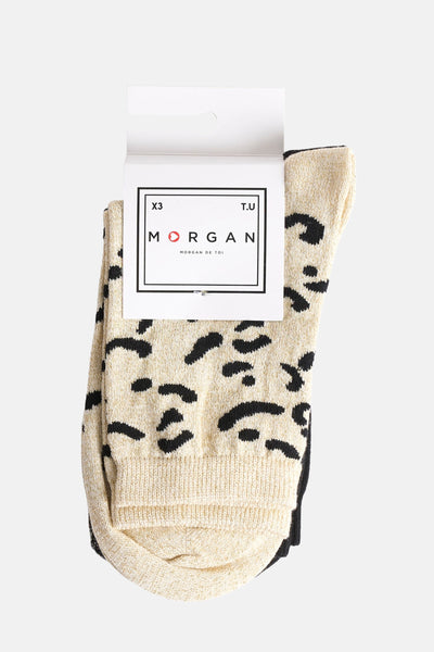 Multikleuren sokken van Morgan de Toi, met een zwart luipaardpatroon op een gebreide beige achtergrond.