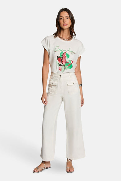 T-shirt à manches courtes blanc de Morgan de Toi, avec un imprimé floral et le mot « Paradise ».
