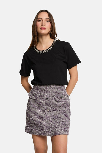 Jupe courte en tweed multicolore de Morgan de Toi, avec poches à rabat boutonnées et coupe trapèze.