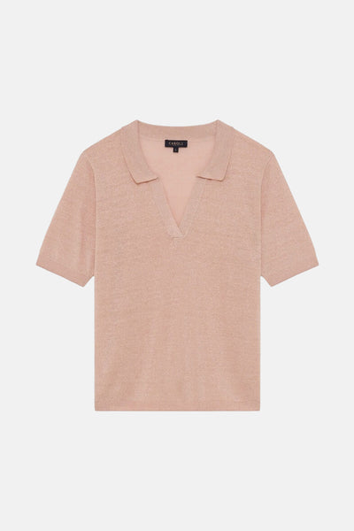 Polo rose à manches courtes de CAROLL, en maille brillante avec un col classique.