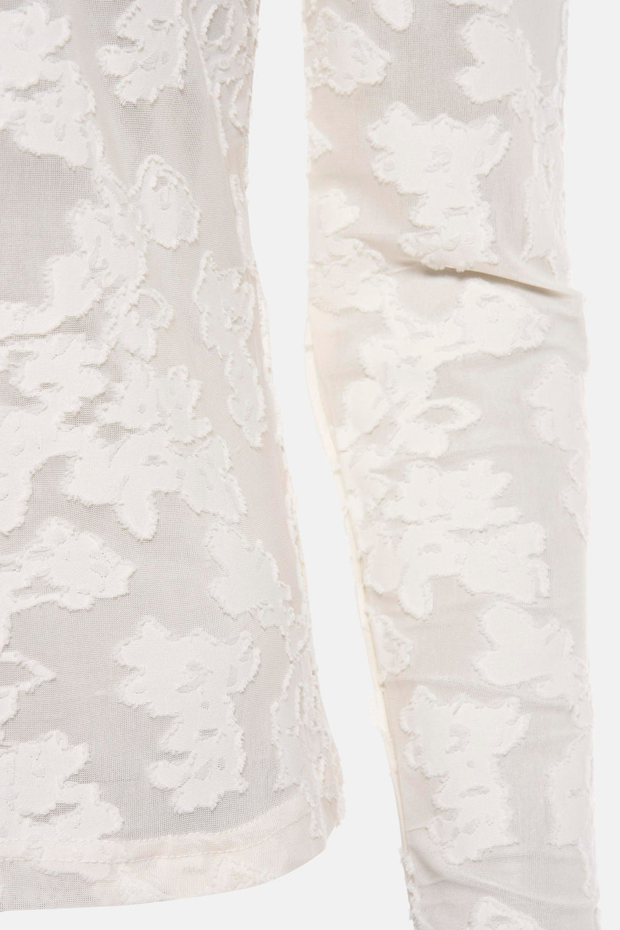 T-shirt à manches longues blanc de Morgan de Toi avec motif floral texturé sur maille transparente.
