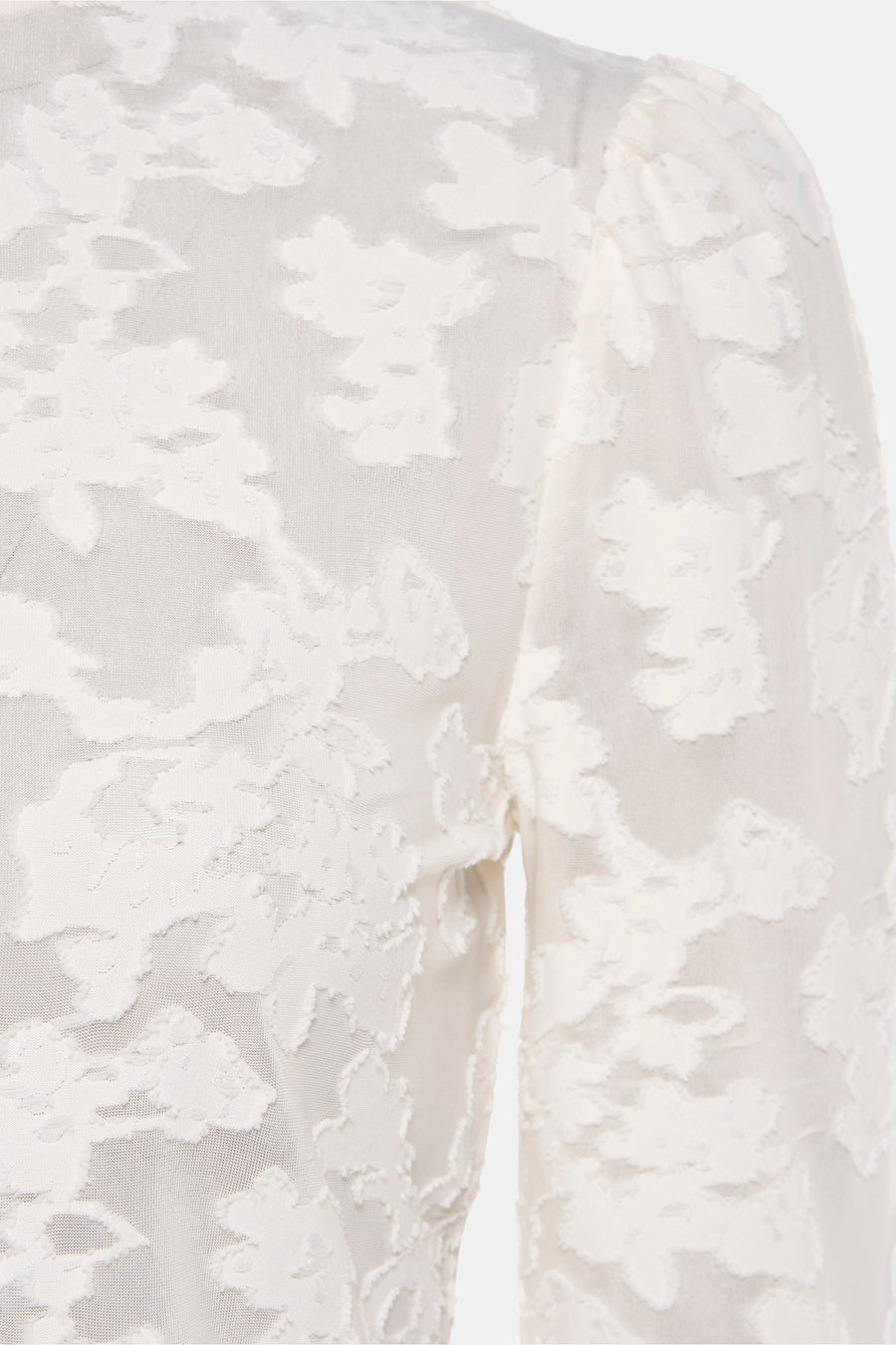 T-shirt à manches longues blanc de Morgan de Toi avec un motif floral texturé ton sur ton.