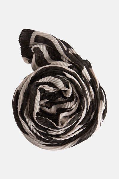 Multikleuren sjaal van Morgan de Toi, opgerold, met zwart en beige zebraprint, glinsterende details.